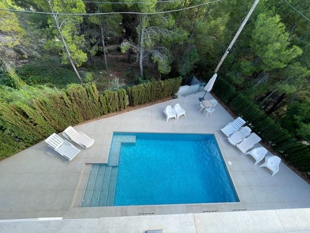 4 Zimmer Villa zu verkaufen in Calpe / Calp mit Pool Garage - 865.000 € (Ref: 8766061)