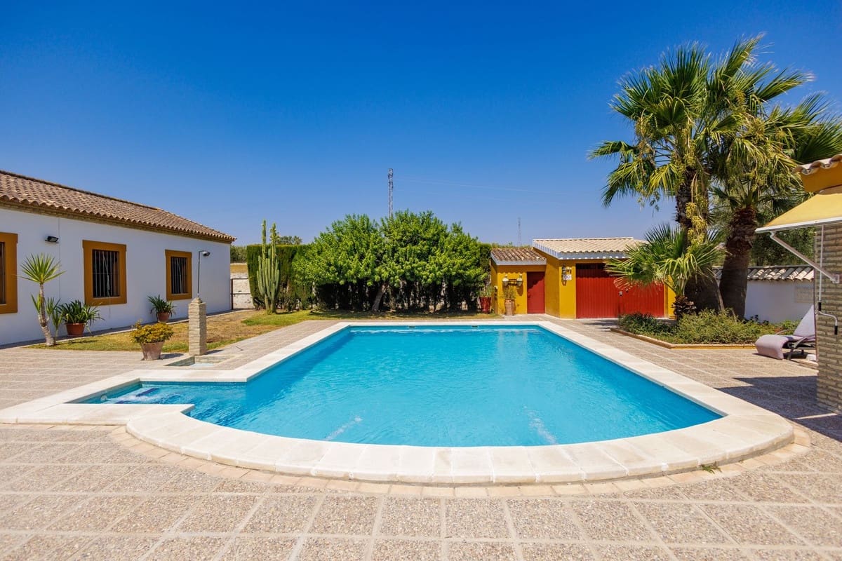 6 soveværelse Finca/Landehus til salg i Moron de la Frontera med swimmingpool garage - € 695.000 (Ref: 9720713)