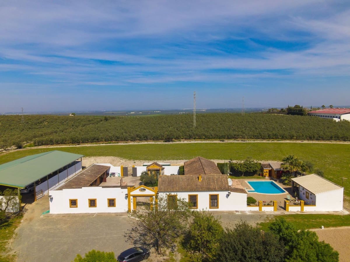 6 soveværelse Finca/Landehus til salg i Moron de la Frontera med swimmingpool garage - € 695.000 (Ref: 9720713)