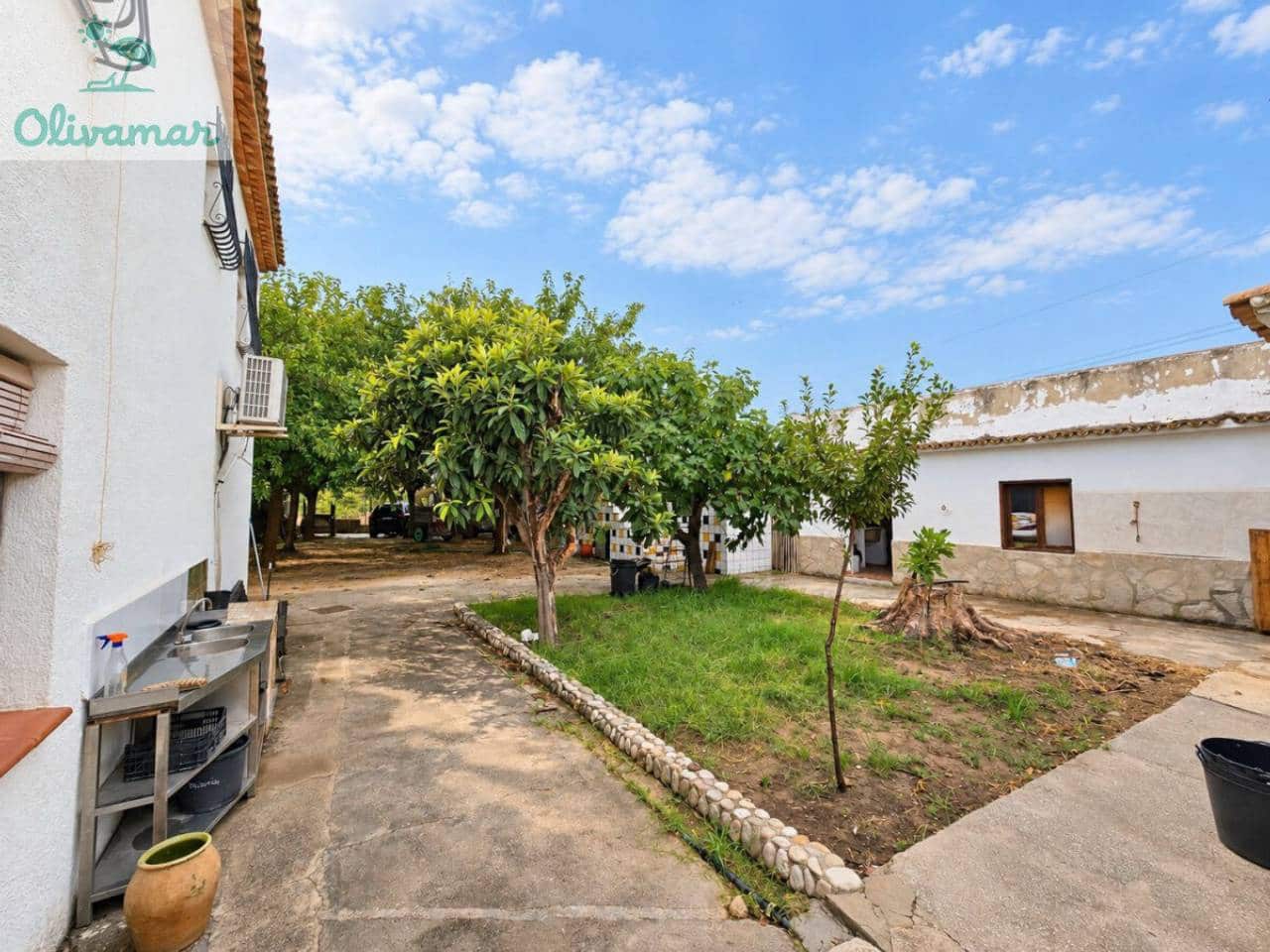 7 sypialnia Willa na sprzedaż w Oliva z basenem garażem - 590 000 € (Ref: 10080299)
