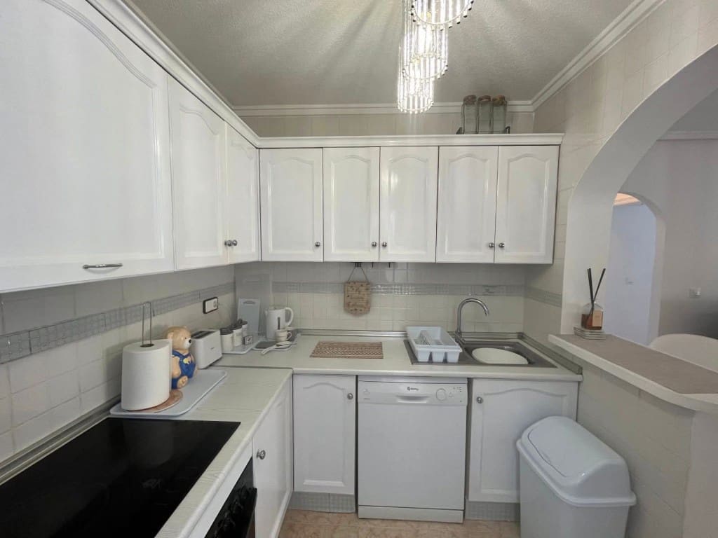 2 slaapkamer Rijtjeshuis te koop in Orihuela Costa met zwembad - € 209.999 (Ref: 9731288)