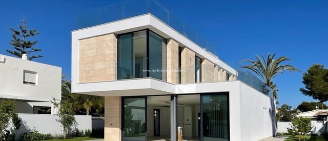 Chalet de 4 habitaciones en La Zenia, Orihuela en venta con piscina garaje - 1.550.000 € (Ref: 6516148)