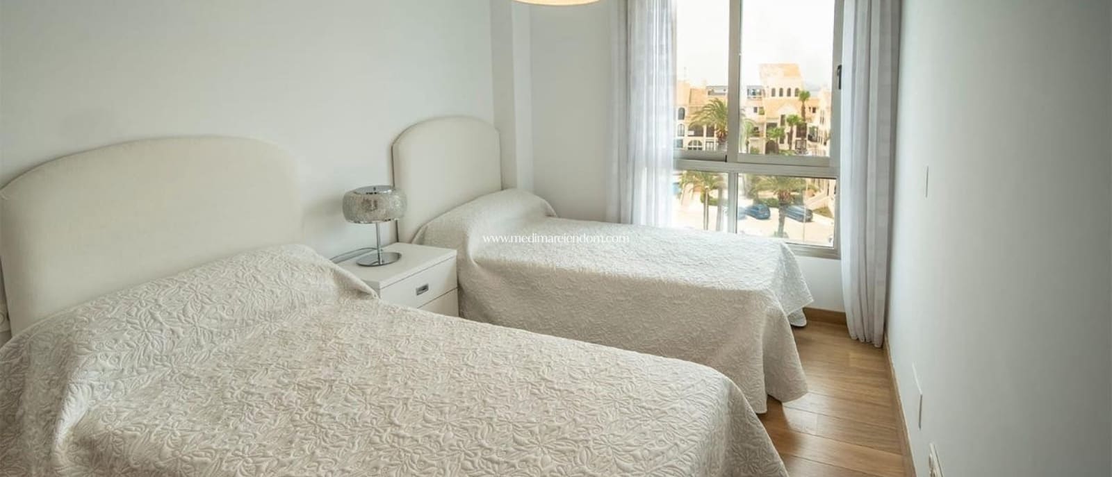 4 soveværelse Lejlighed til salg i La Manga del Mar Menor med swimmingpool garage - € 350.000 (Ref: 9309308)