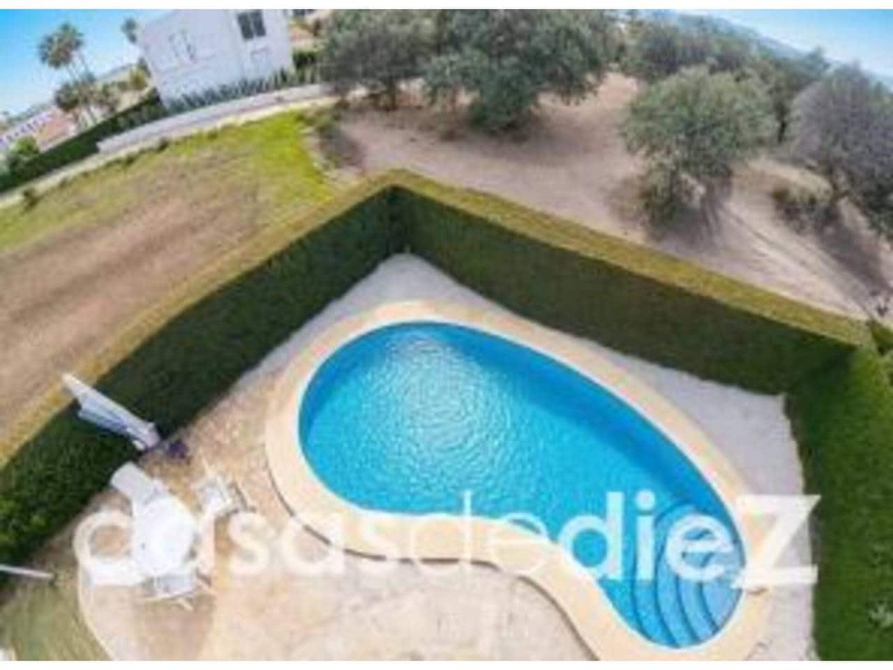 3 soveværelse Villa til salg i Oliva Nova med swimmingpool - € 495.000 (Ref: 9614563)