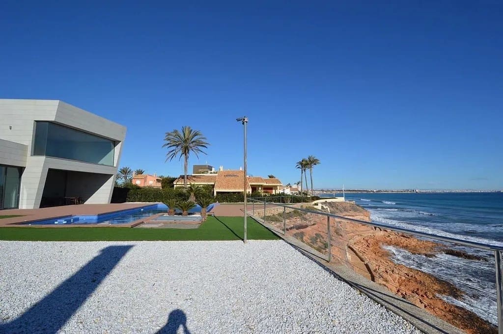 6 bedroom Villa for sale in Cabo Roig with pool garage - € 2,790,000 (Ref: 8697885)