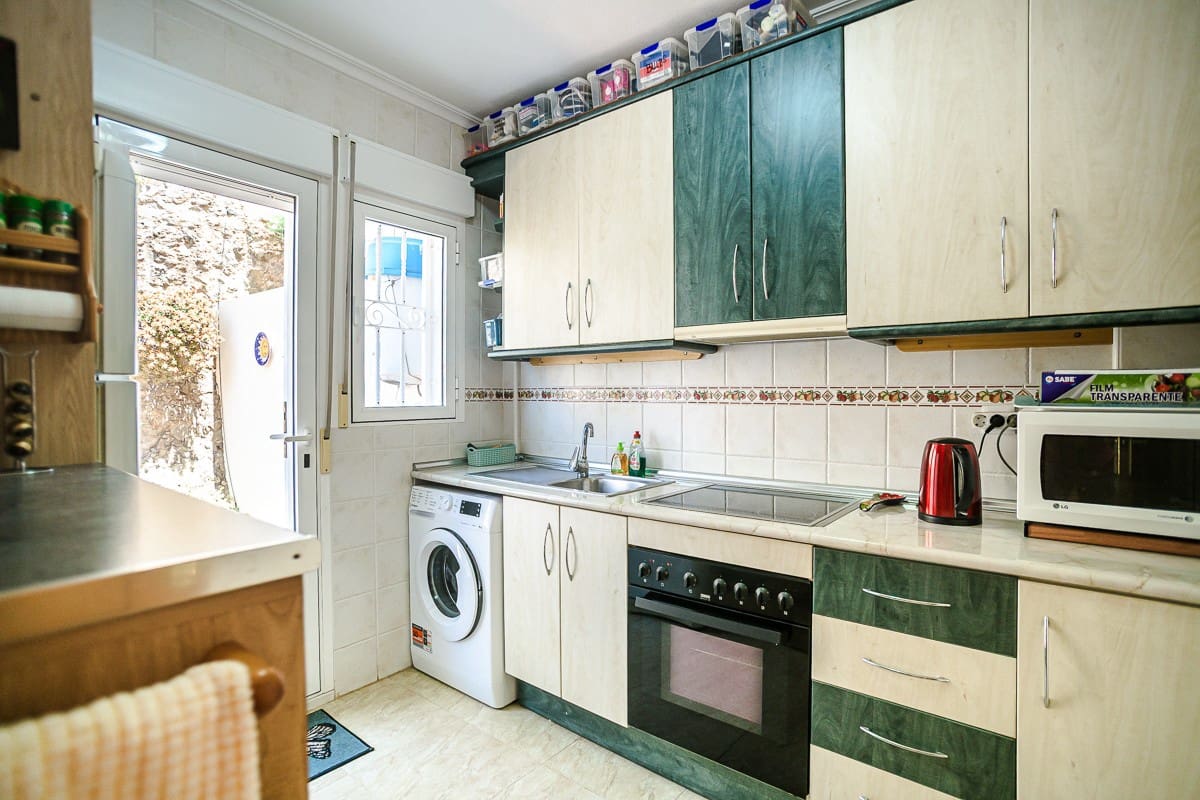2 quarto Casa em Banda para venda em El Carmoli com piscina - 147 500 € (Ref: 9898872)