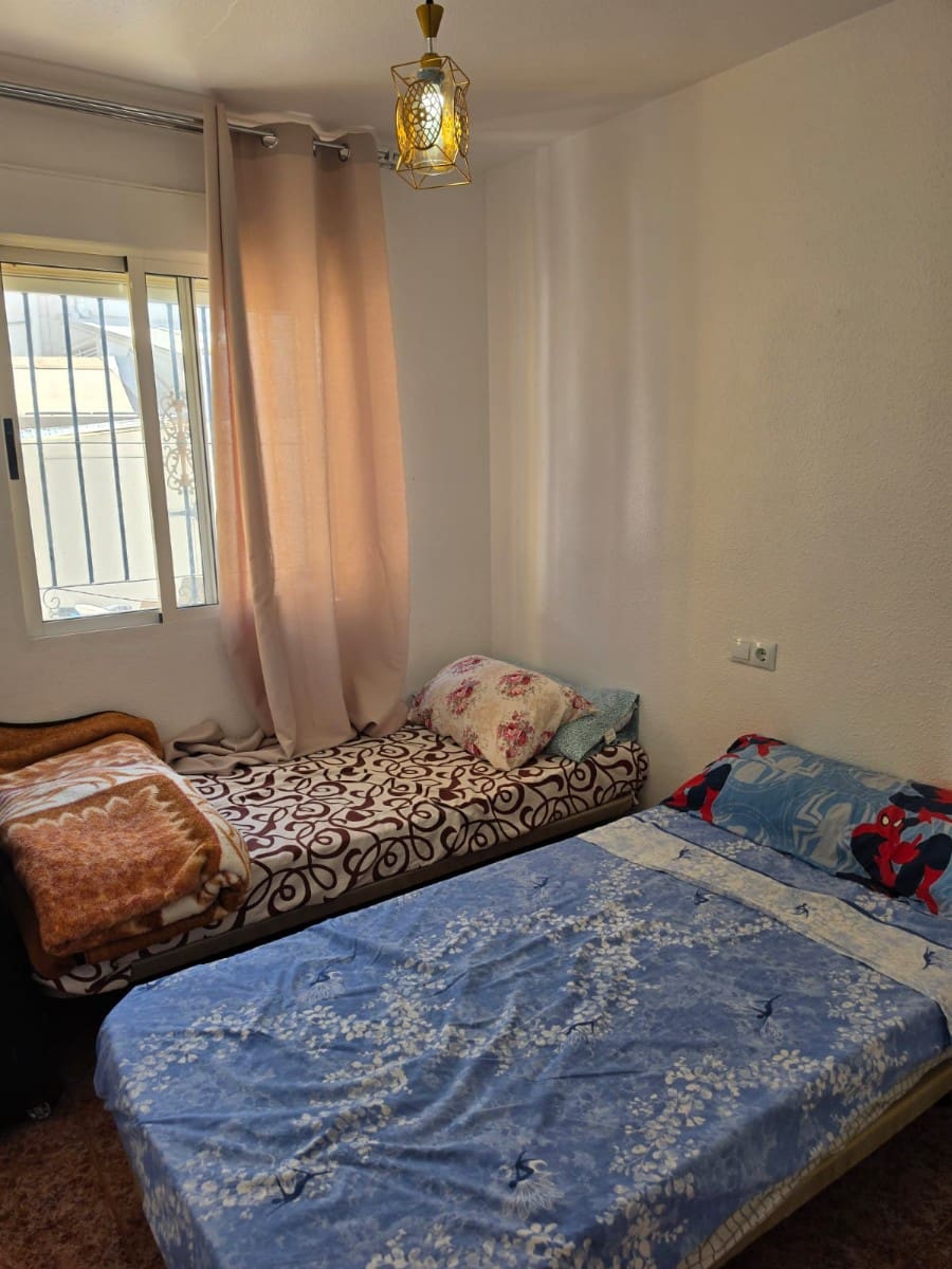 3 quarto Casa em Banda para venda em Torrevieja com piscina - 228 000 € (Ref: 9798204)