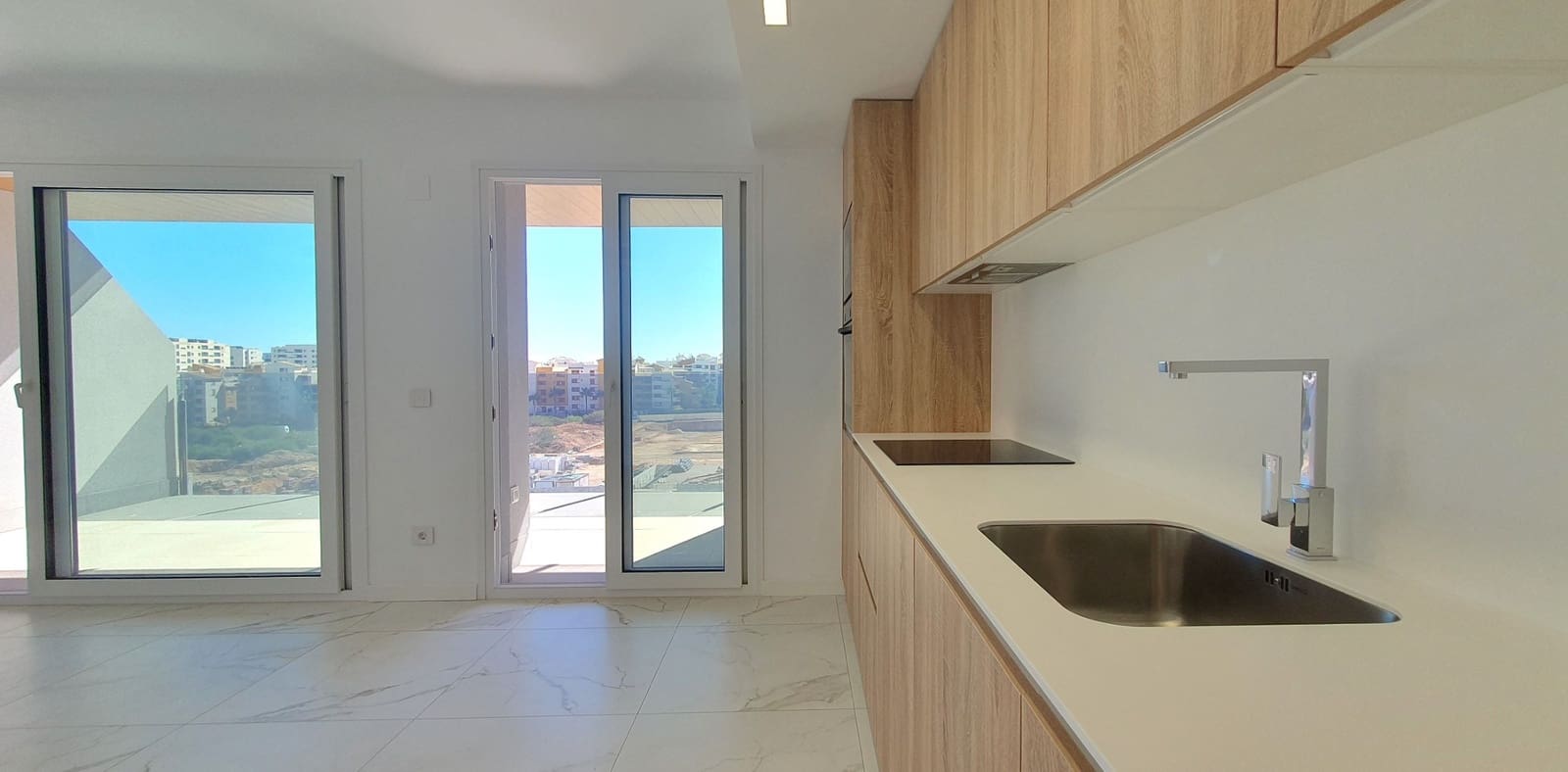 Apartamento de 2 habitaciones en Punta Prima en venta con piscina garaje - 373.000 € (Ref: 10095744)