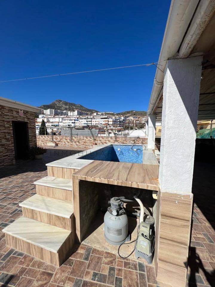 Casa de 8 habitaciones en Benalmádena en venta con garaje - 750.000 € (Ref: 9583207)