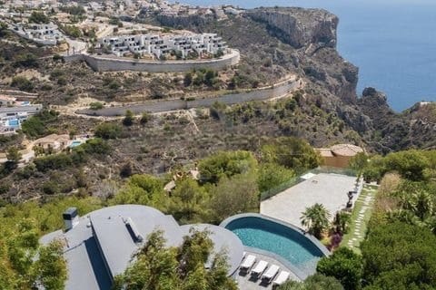 4 camera da letto Villa in vendita in Cumbre del Sol con piscina garage - 1.200.000 € (Rif: 8684459)