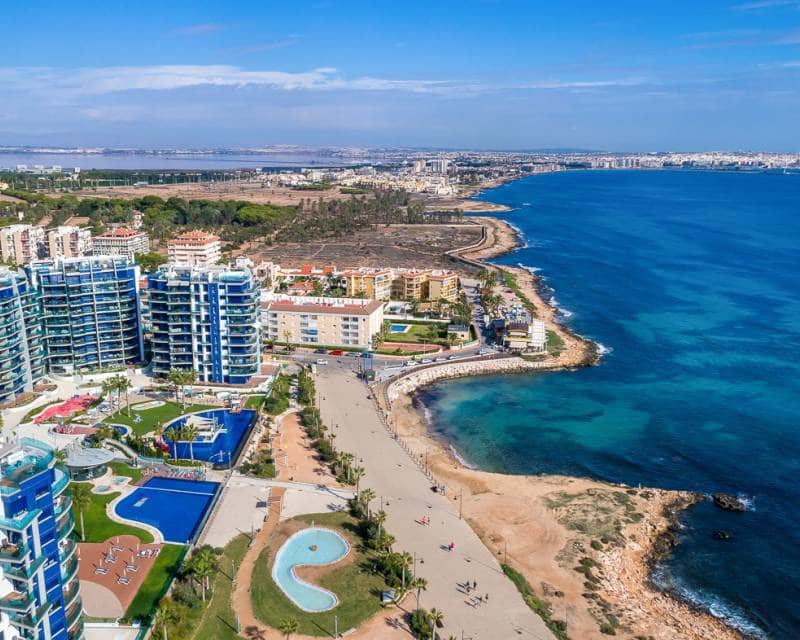 2 bedroom Beach Apartment for sale in Punta Prima with pool garage - € 420,000 (Ref: 9301418)