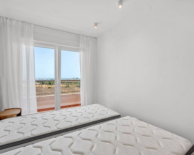 2 sypialnia Apartament na sprzedaż w Punta Prima z basenem garażem - 225 000 € (Ref: 9968869)
