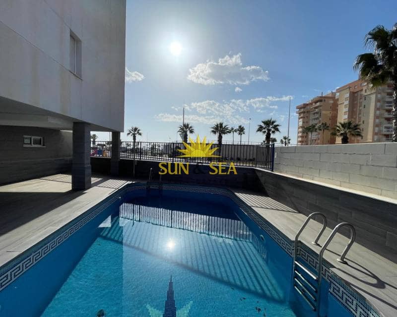2 sovrum Lägenhet att hyra i La Manga del Mar Menor med pool garage - 1 000 € (Ref: 8635057)