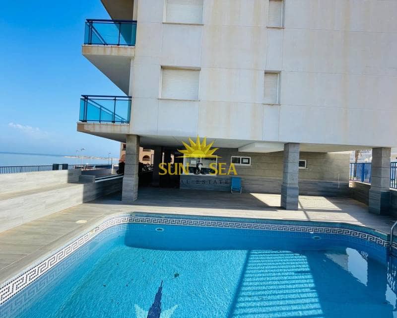 2 sovrum Lägenhet att hyra i La Manga del Mar Menor med pool garage - 1 000 € (Ref: 8635057)