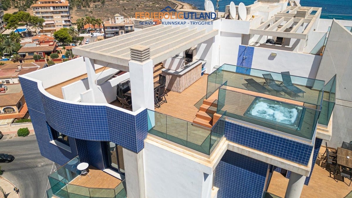 3 sypialnia Penthouse na sprzedaż w Orihuela Costa z basenem garażem - 810 000 € (Ref: 10012268)
