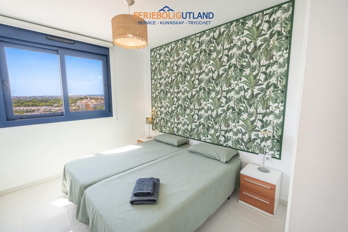 3 sypialnia Penthouse na sprzedaż w Orihuela Costa z basenem garażem - 810 000 € (Ref: 10012268)
