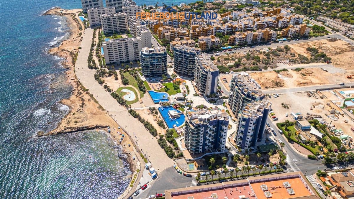3 sypialnia Penthouse na sprzedaż w Orihuela Costa z basenem garażem - 810 000 € (Ref: 10012268)