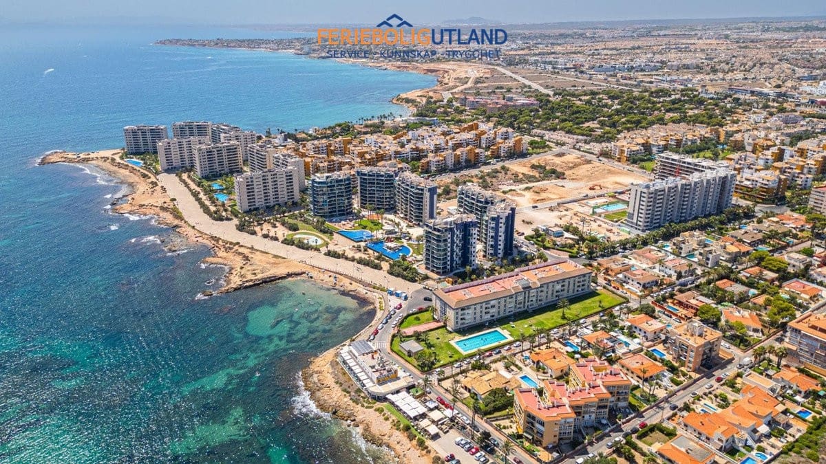 3 sypialnia Penthouse na sprzedaż w Orihuela Costa z basenem garażem - 810 000 € (Ref: 10012268)