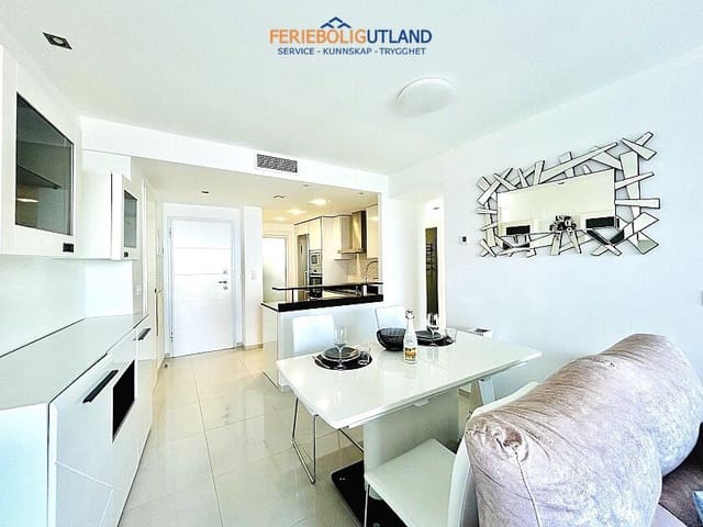 2 soverom Leilighet til salgs i Punta Prima, Orihuela med svømmebasseng garasje - € 398 000 (Ref: 10031014)