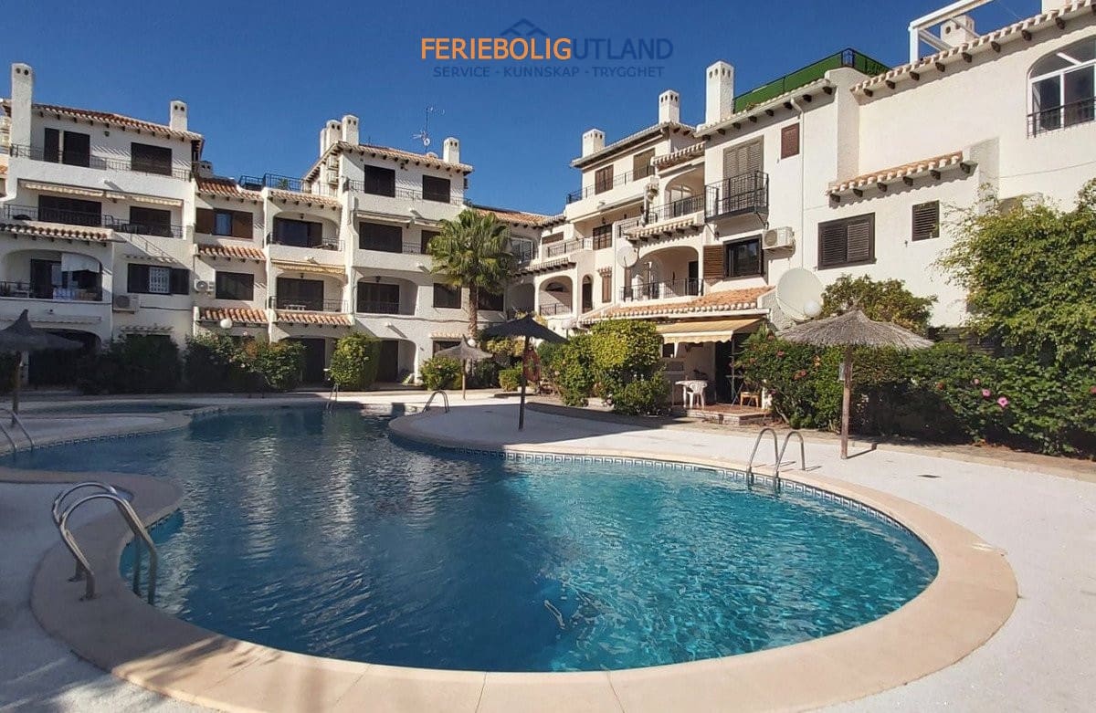 2 Zimmer Apartment zu verkaufen in Cabo Roig mit Pool - 245.000 € (Ref: 10044105)
