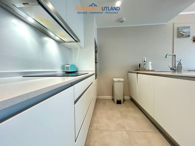 Apartamento de 2 habitaciones en Campoamor, Orihuela en venta con piscina garaje - 379.000 € (Ref: 10076976)