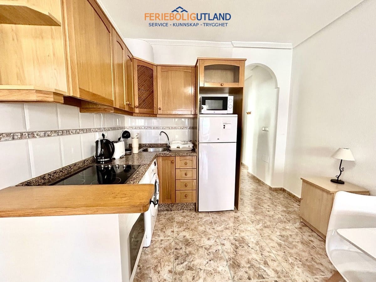 Apartamento de 2 habitaciones en Cabo Roig en venta con piscina garaje - 229.995 € (Ref: 10100532)