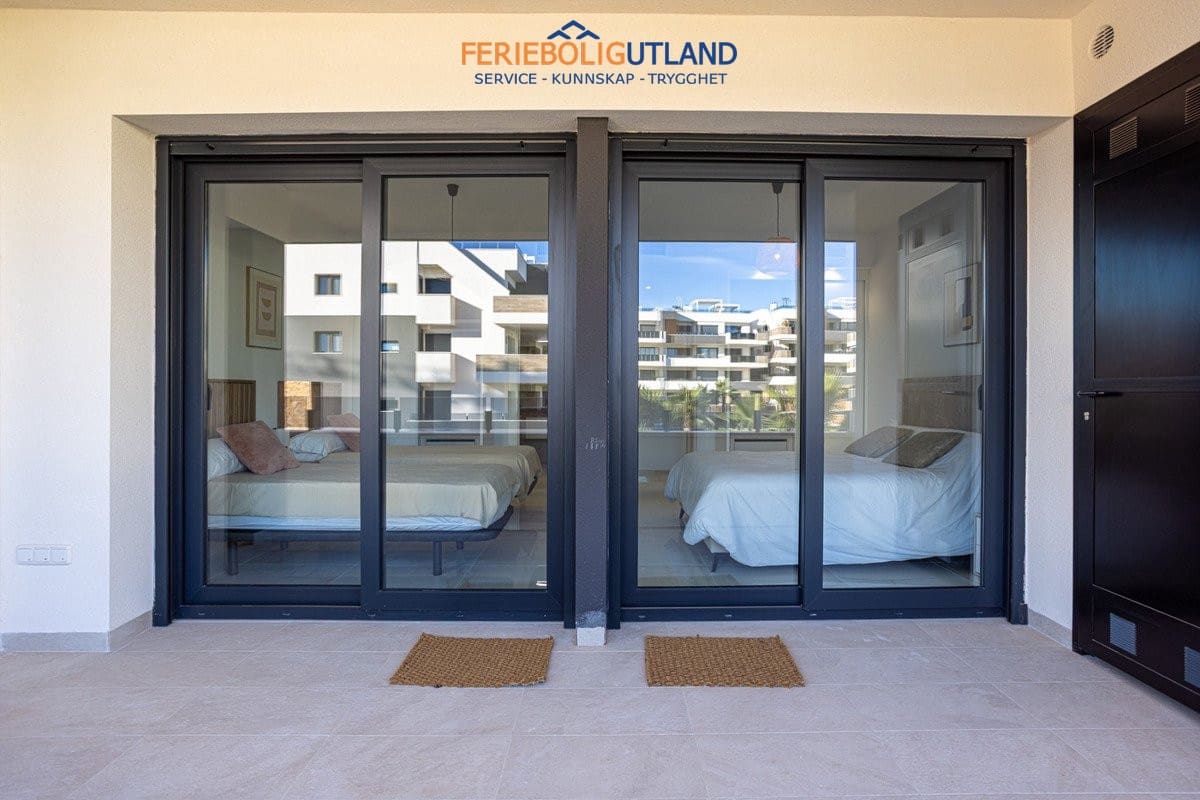 Apartamento de 2 habitaciones en Orihuela Costa en venta con piscina garaje - 279.000 € (Ref: 10136544)