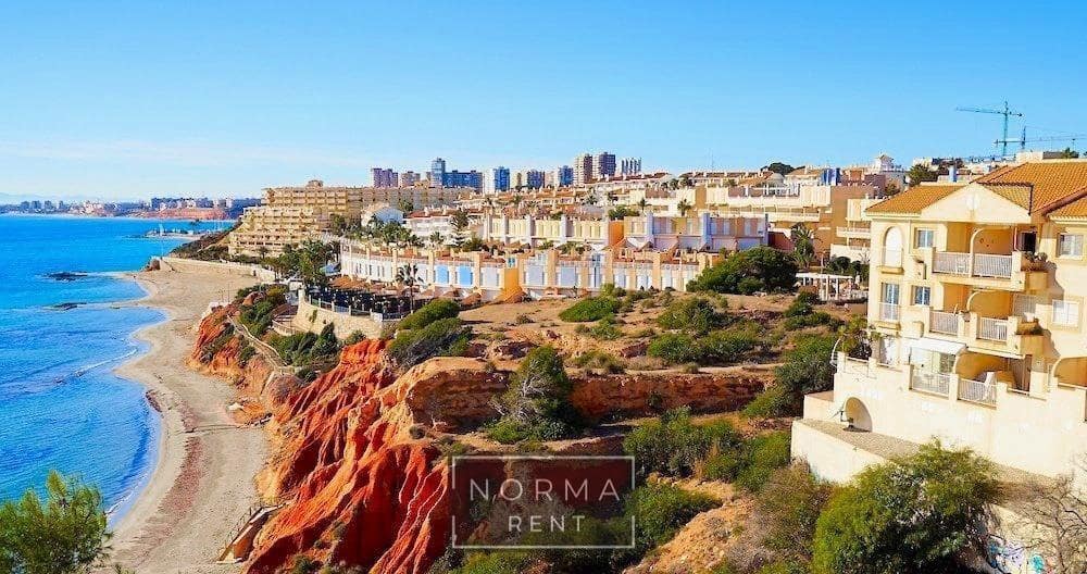 2 soveværelse Lejlighed til leje i Orihuela Costa med swimmingpool garage - € 850 (Ref: 9849458)