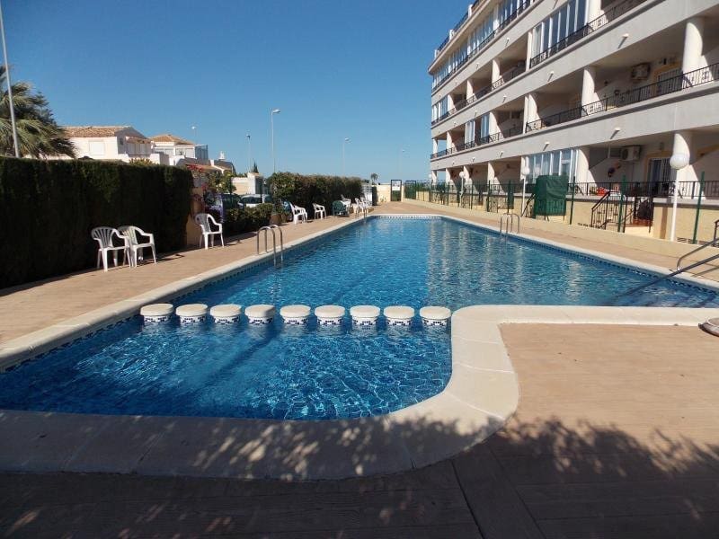 2 bedroom Apartment for sale in Playa Flamenca with pool - € 129,000 (Ref: 9146031)