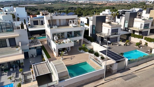 4 Zimmer Villa zu verkaufen in Dehesa de Campoamor, Orihuela mit Pool Garage - 1.890.000 € (Ref: 9953138)