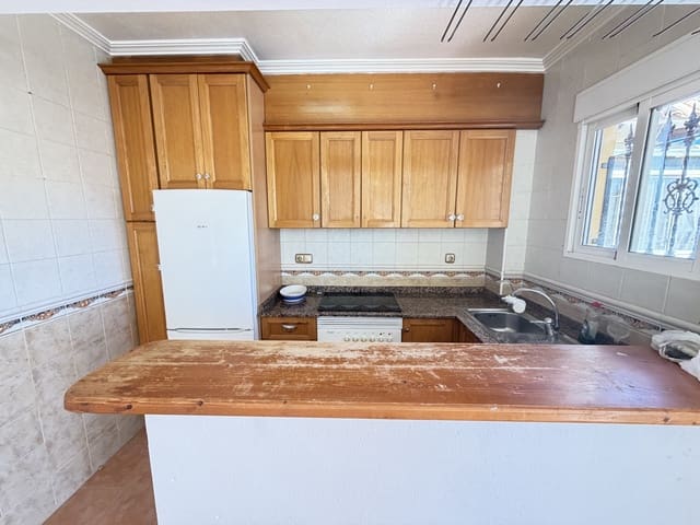 3 soverom Kjedet enebolig til salgs i Playa Flamenca, Orihuela med svømmebasseng - € 195 000 (Ref: 9902248)