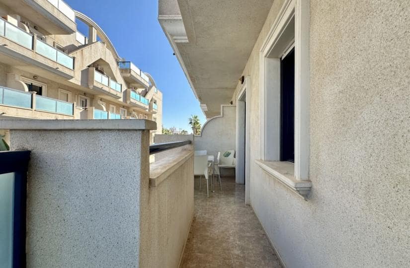 2 soverom Leilighet til salgs i Cabo Roig med svømmebasseng garasje - € 185 000 (Ref: 9420304)
