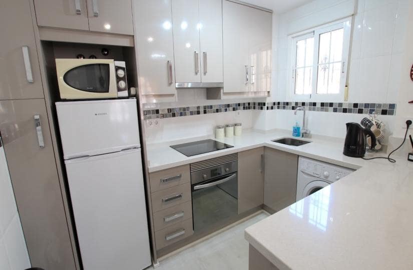 2 quarto Casa em Banda para venda em Cabo Roig com piscina garagem - 235 000 € (Ref: 9819964)