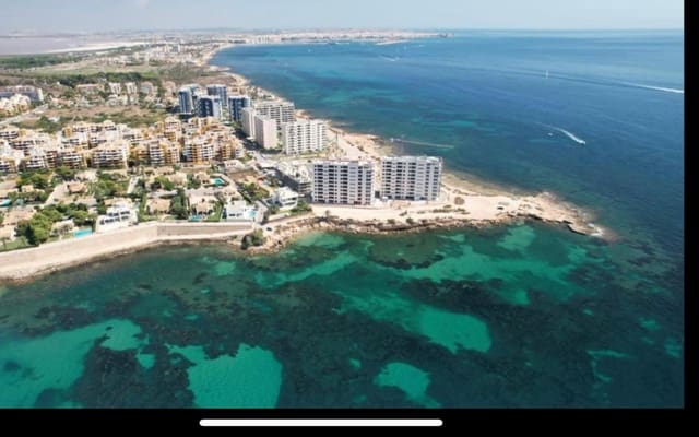 2 slaapkamer Appartement te koop in Punta Prima, Orihuela met zwembad - € 540.000 (Ref: 9081205)