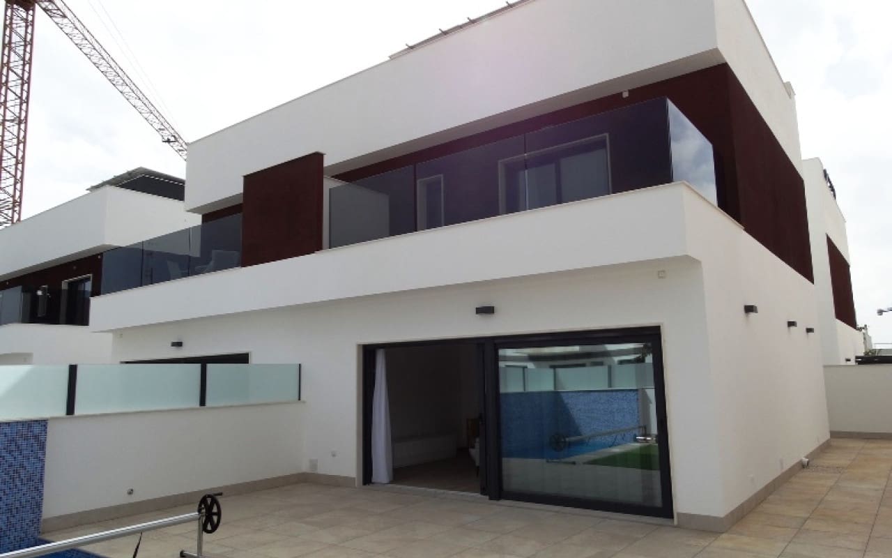 3 quarto Casa em Banda para venda em Pilar de la Horadada com piscina - 379 900 € (Ref: 9084327)