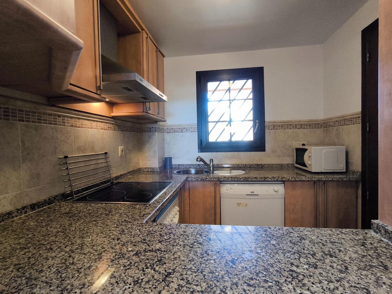 Appartement de 2 chambres à louer à Isla Canela avec piscine garage - 950 € (Ref: 9831636)