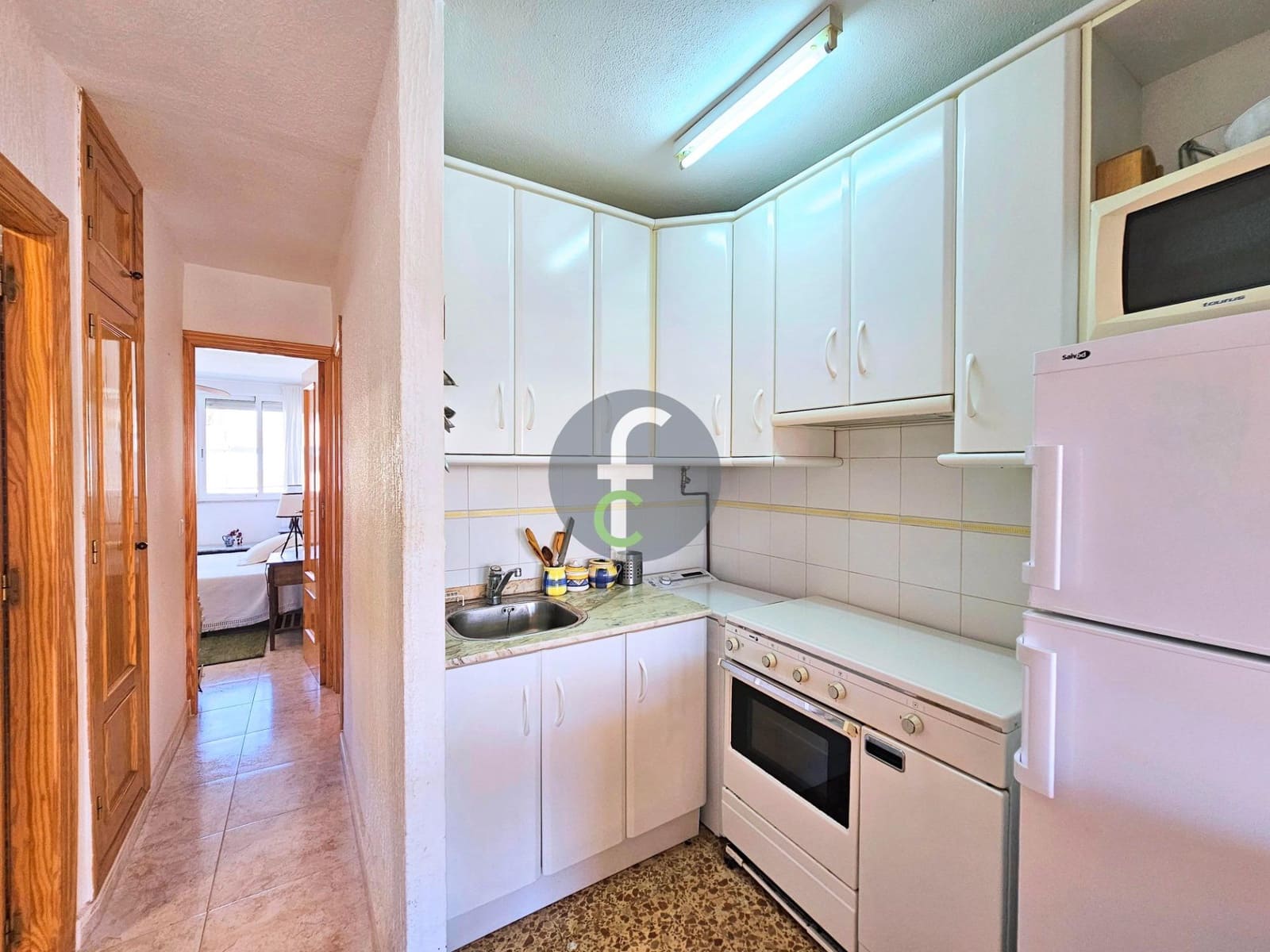 Piso de 2 habitaciones en La Manga del Mar Menor en venta con garaje - 129.000 € (Ref: 9003017)