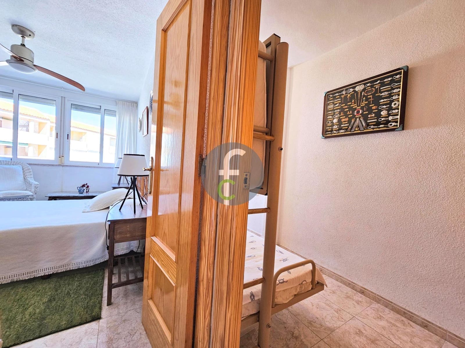 Piso de 2 habitaciones en La Manga del Mar Menor en venta con garaje - 129.000 € (Ref: 9003017)