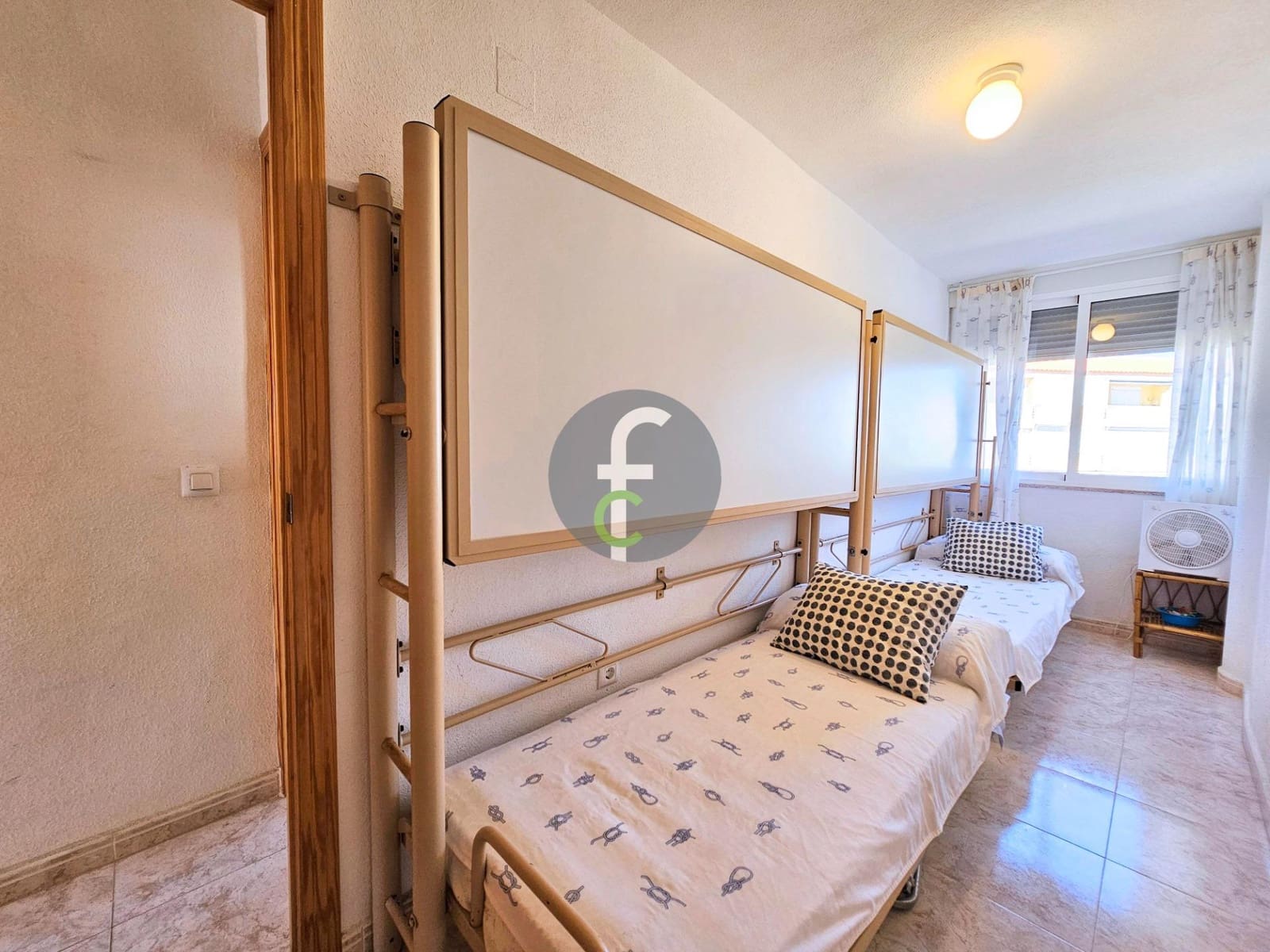 Piso de 2 habitaciones en La Manga del Mar Menor en venta con garaje - 129.000 € (Ref: 9003017)