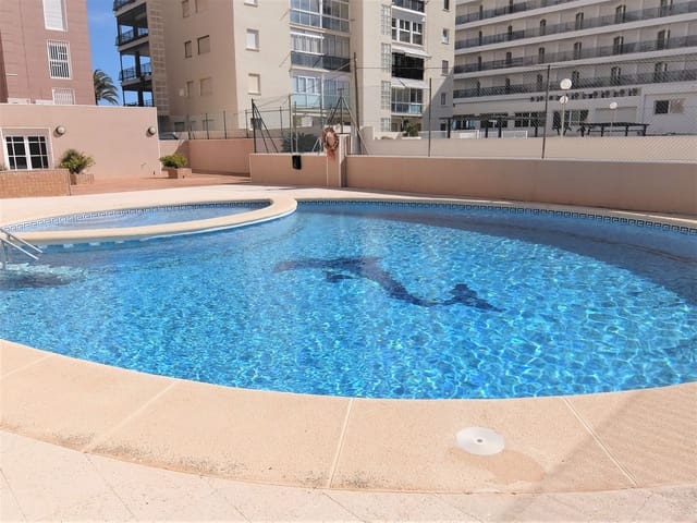3 Zimmer Strandapartment zu vermieten in Gandia mit Pool Garage - 900 € (Ref: 8241069)
