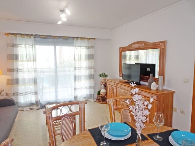 3 Zimmer Strandapartment zu vermieten in Gandia mit Pool Garage - 550 € (Ref: 8241070)