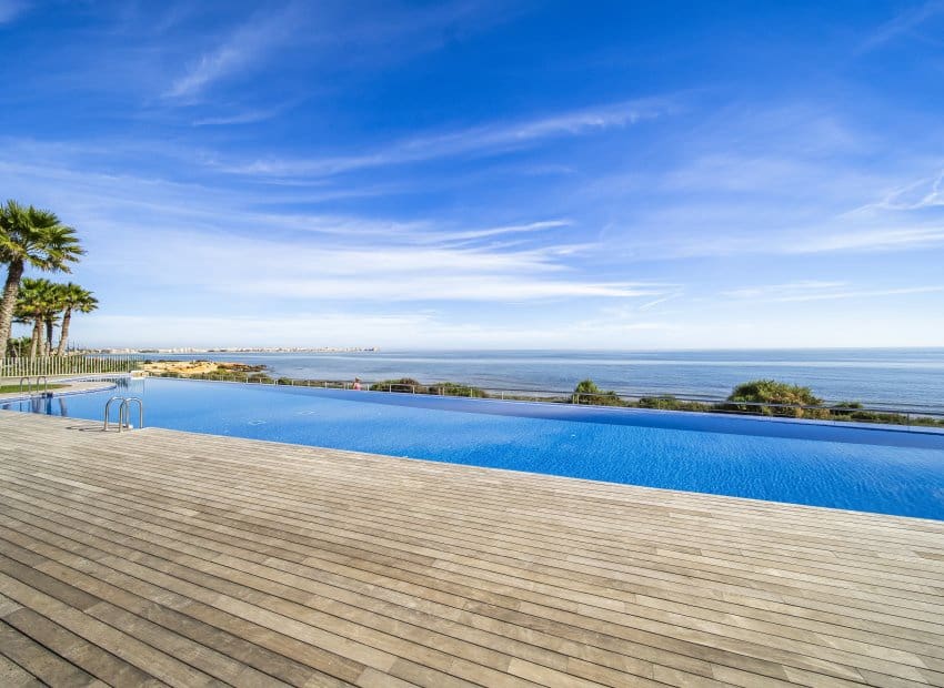 2 bedroom Beach Apartment for sale in Punta Prima with pool - € 460,000 (Ref: 9397014)