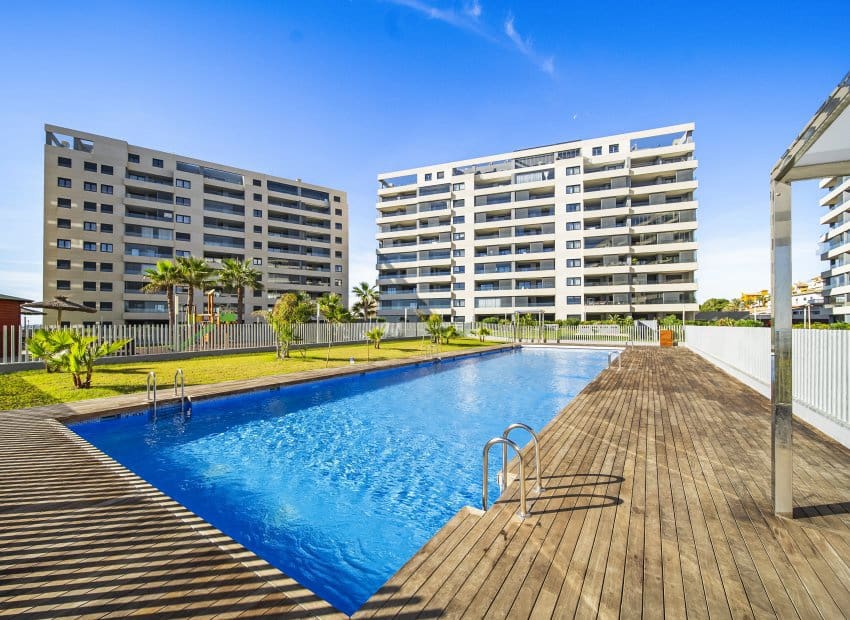 2 bedroom Beach Apartment for sale in Punta Prima with pool - € 460,000 (Ref: 9397014)