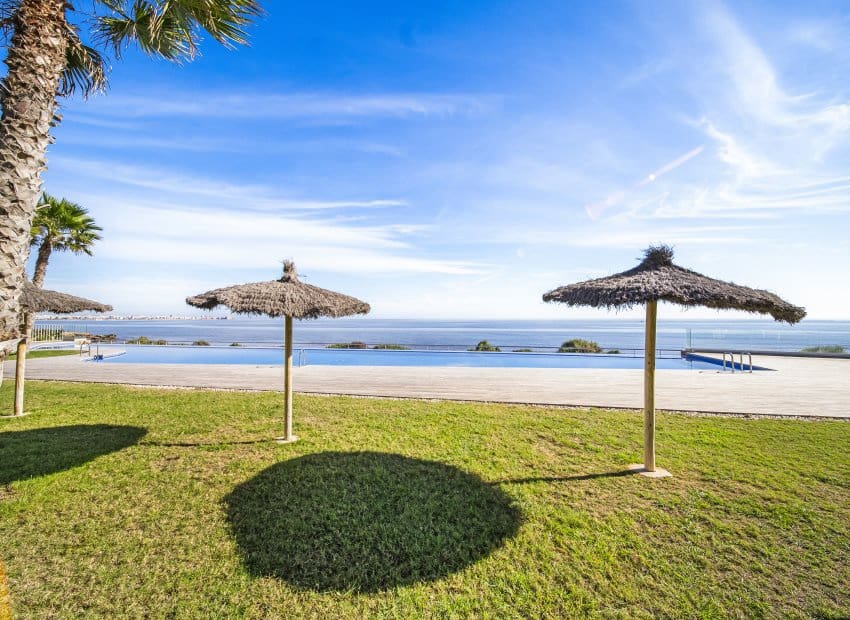 2 bedroom Beach Apartment for sale in Punta Prima with pool - € 460,000 (Ref: 9397014)