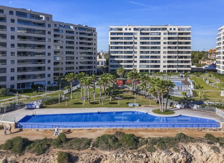 2 bedroom Beach Apartment for sale in Punta Prima with pool - € 460,000 (Ref: 9397014)