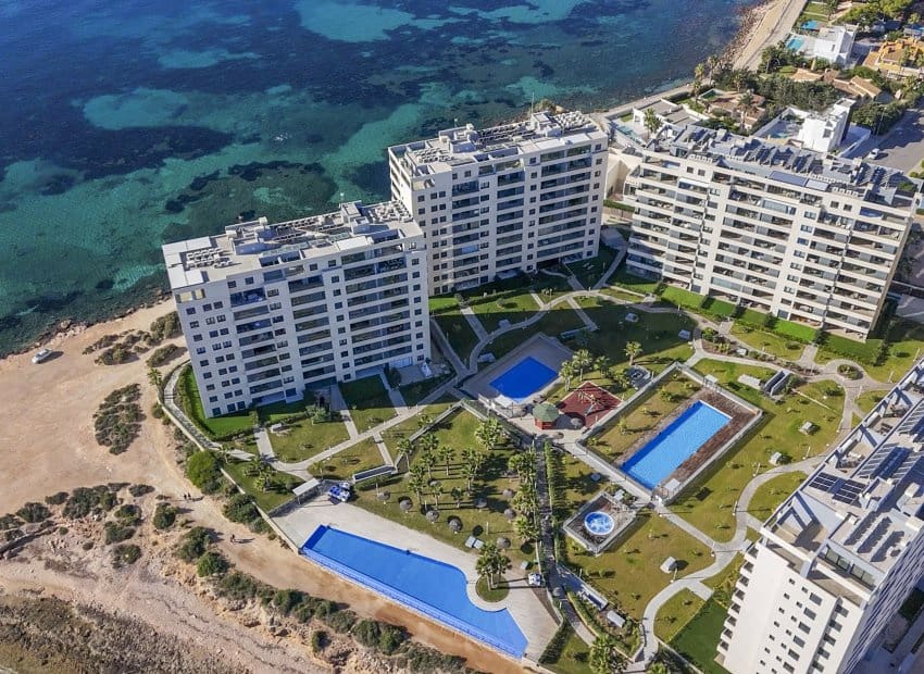 2 bedroom Beach Apartment for sale in Punta Prima with pool - € 460,000 (Ref: 9397014)