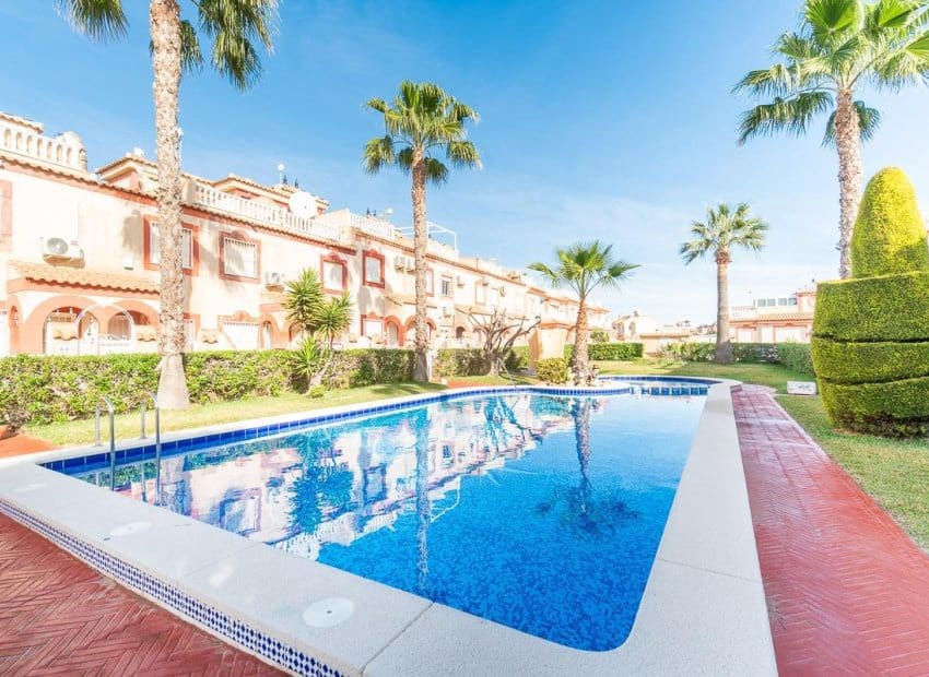 2 quarto Casa em Banda para venda em Playa Flamenca com piscina - 195 000 € (Ref: 9640612)