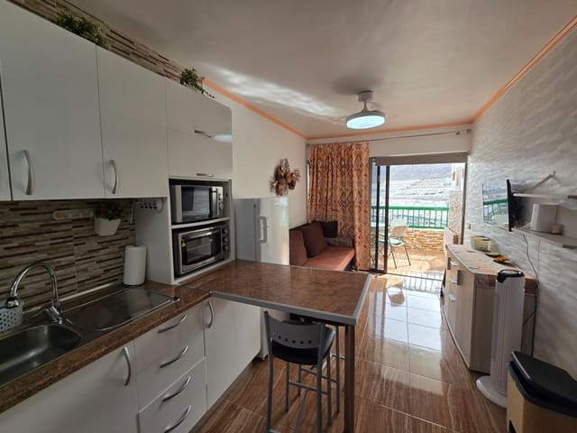 1 sovrum Lägenhet att hyra i Puerto Rico, Mogán med pool garage - 1 200 € (Ref: 10098432)