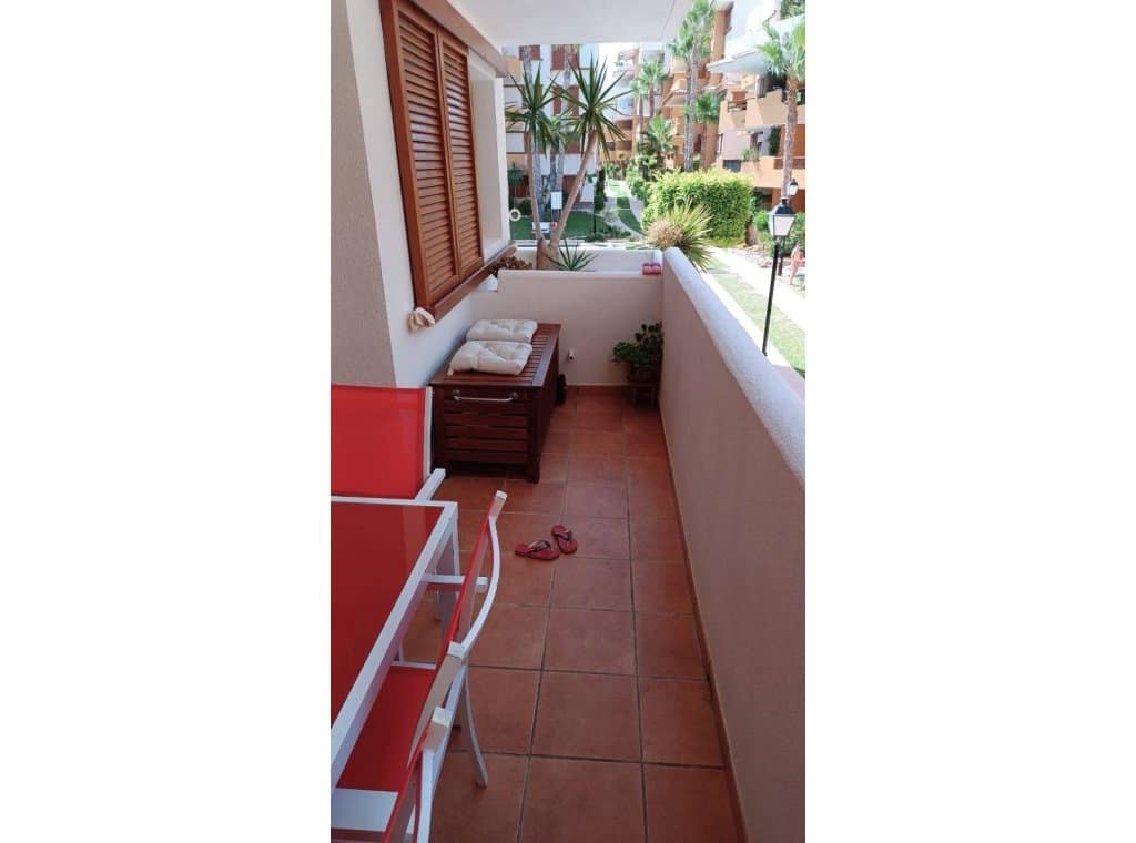 2 slaapkamer Strandappartement te huur in Orihuela Costa met zwembad garage - € 1.000 (Ref: 9211694)
