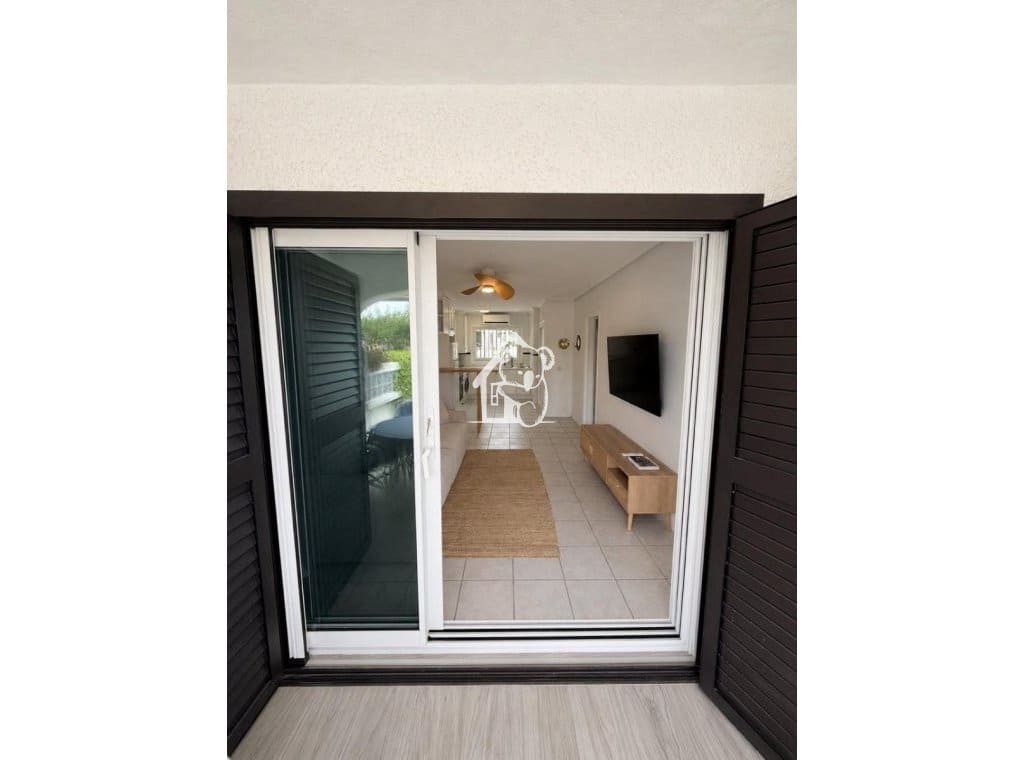 2 soveværelse Strandlejlighed til leje i Orihuela Costa med swimmingpool garage - € 1.450 (Ref: 9944989)